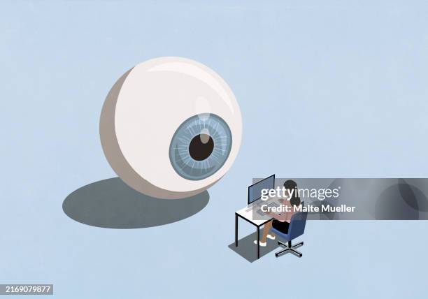 large blue eyeball watching businesswoman working at computer - computer top view illustration stock illustrations