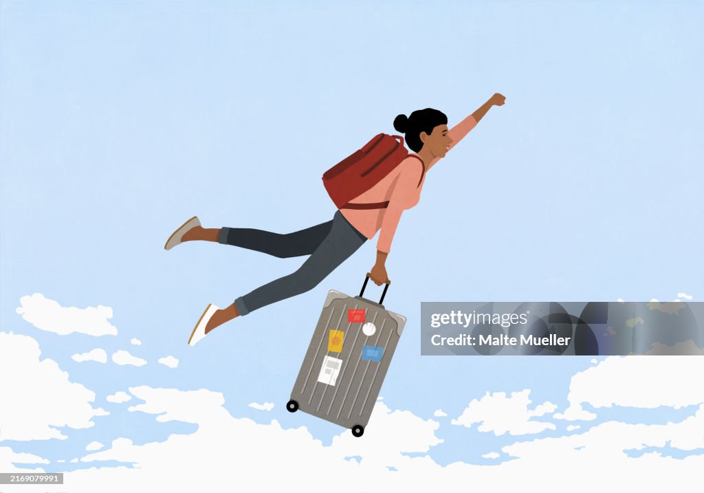 Carefree woman with backpack and suitcase flying in sky