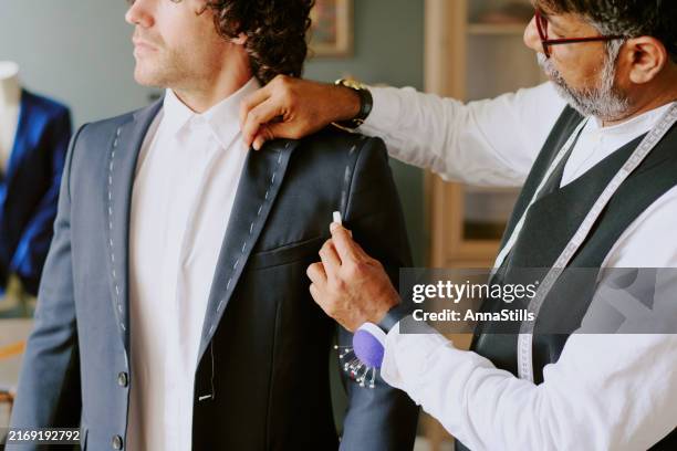 tailor sewing tuxedo