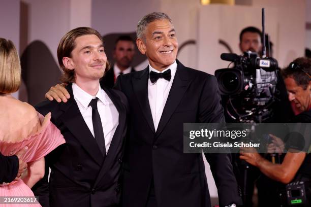 Austin Abram andGeorge Clooney attend the "Wolfs" red carpet during the 81st Venice International Film Festival at Palazzo del Cinema on September 1,...