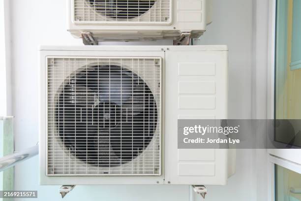 air conditioner or heating ventilation air conditioning system. - kondensator stock-fotos und bilder