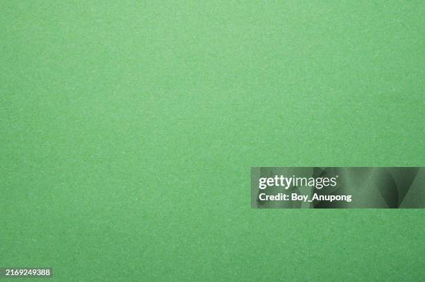 full frame shot of light green paper sheet texture and background. - green paper texture stock pictures, royalty-free photos & images