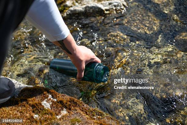 tourist travels in the khibiny mountains - brook stock pictures, royalty-free photos & images