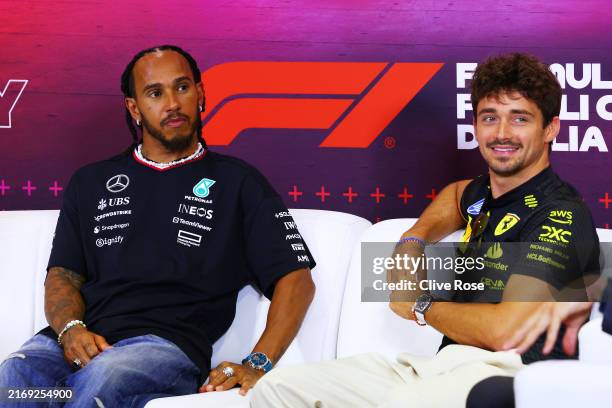 Lewis Hamilton of Great Britain and Mercedes and Charles Leclerc of Monaco and Ferrari attend the Drivers Press Conference during previews ahead of...
