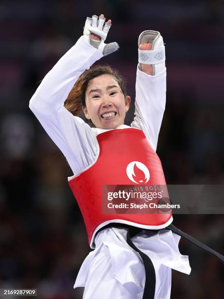 Zakia Khudadadi of Refugee Paralympic Team celebrates after winning the Women's Taekwondo K44 -47kg Repechage contest against Nurcihan Ekinci of Team...