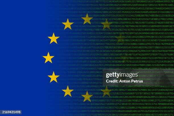 cybersecurity in the eu. digital code and eu flag - europese unie vlag stockfoto's en -beelden