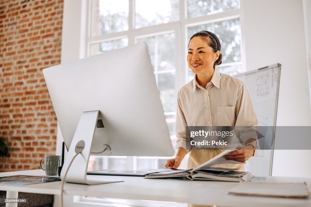 Woman Using Pc Smiling Beautiful Casually Clothed Woman Using Desktop Pc At Modern ...