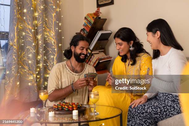 playing card games this diwali - hindu cards stock pictures, royalty-free photos & images