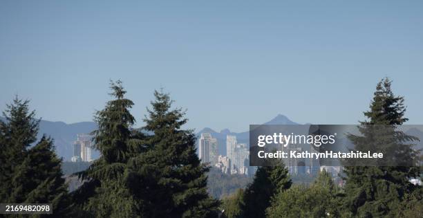 view burnaby and coast mountain range, canada - burnaby stock pictures, royalty-free photos & images