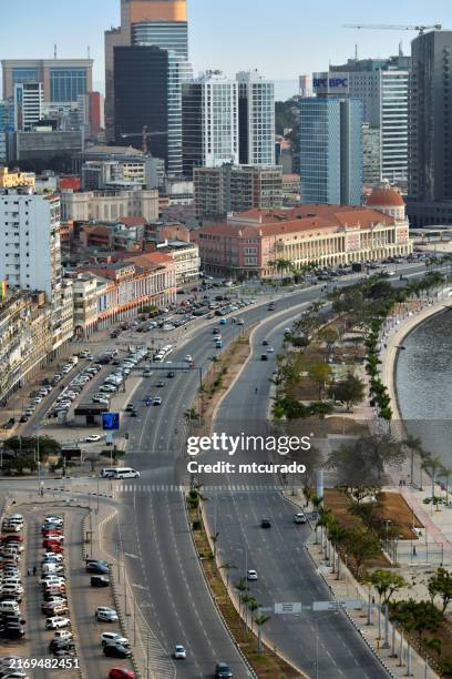 luanda's waterfront avenue - colonial arcade and modern high-rise buildings, the 'marginal', luanda bay, angola - luanda imagens e fotografias de stock