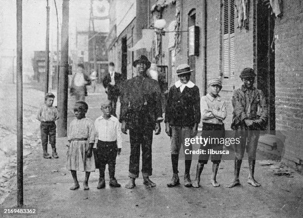 antique photograph: boys in the street, st louis - african american people stock illustrations