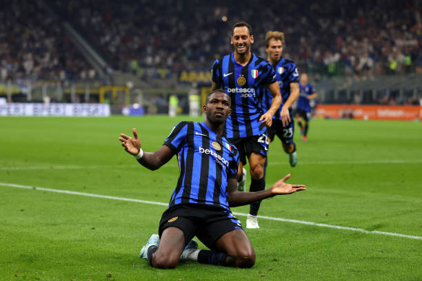 Marcus Thuram of FC Internazionale celebrates after scoring his team's fourth goal during the Serie A match between FC Internazionale and Atalanta at...