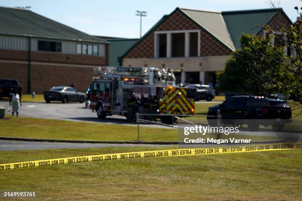 Police line is put up in front of Apalachee High School after a school shooting took place on September 4, 2024 in Winder, Georgia. Multiple...