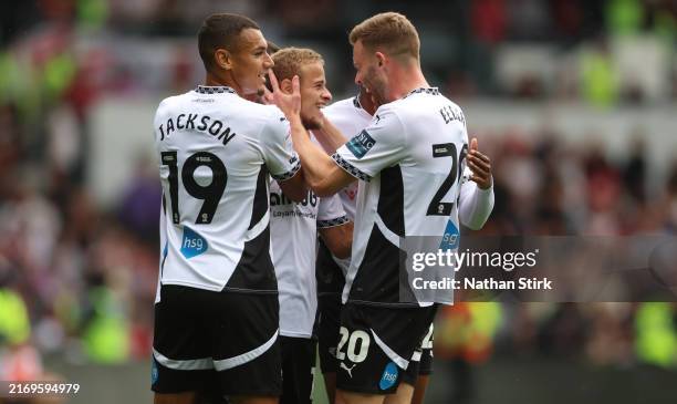 Kenzo Goudmijn of Derby County celebrates with his teammates after he scores their first goal during the Sky Bet Championship match between Derby...