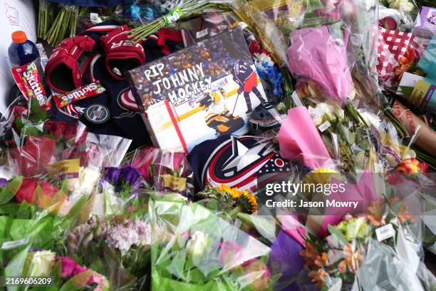 Makeshift memorial grows outside Nationwide Arena for Columbus Blue Jackets forward Johnny Gaudreau at Nationwide Arena on August 31, 2024 in...