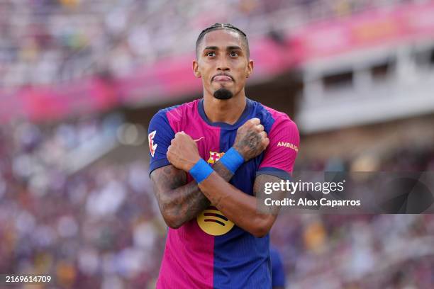 Raphinha of FC Barcelona celebrates scoring his team's fourth goal during the La Liga match between FC Barcelona and Real Valladolid CF at Camp Nou...