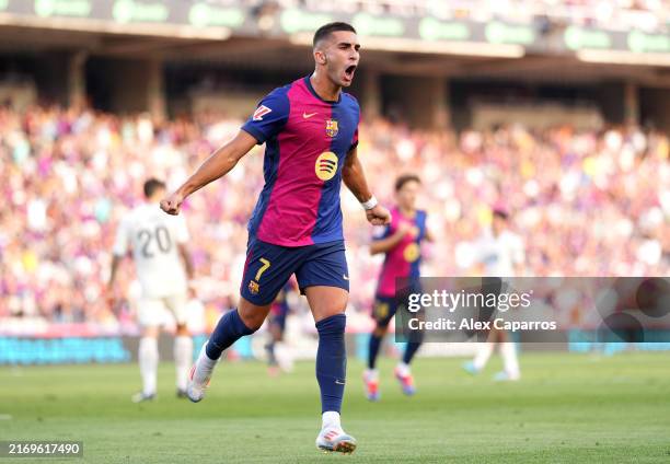 Ferran Torres of FC Barcelona celebrates scoring his team's seventh goal during the La Liga match between FC Barcelona and Real Valladolid CF at Camp...