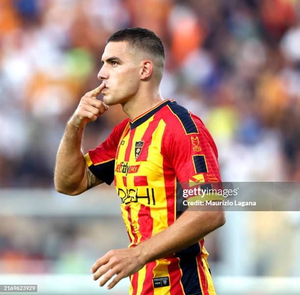 Nikola Krstovic of Lecce celebrates after scoring his team's first goal during the Serie A match between Lecce and Cagliari at Stadio Via del Mare on...