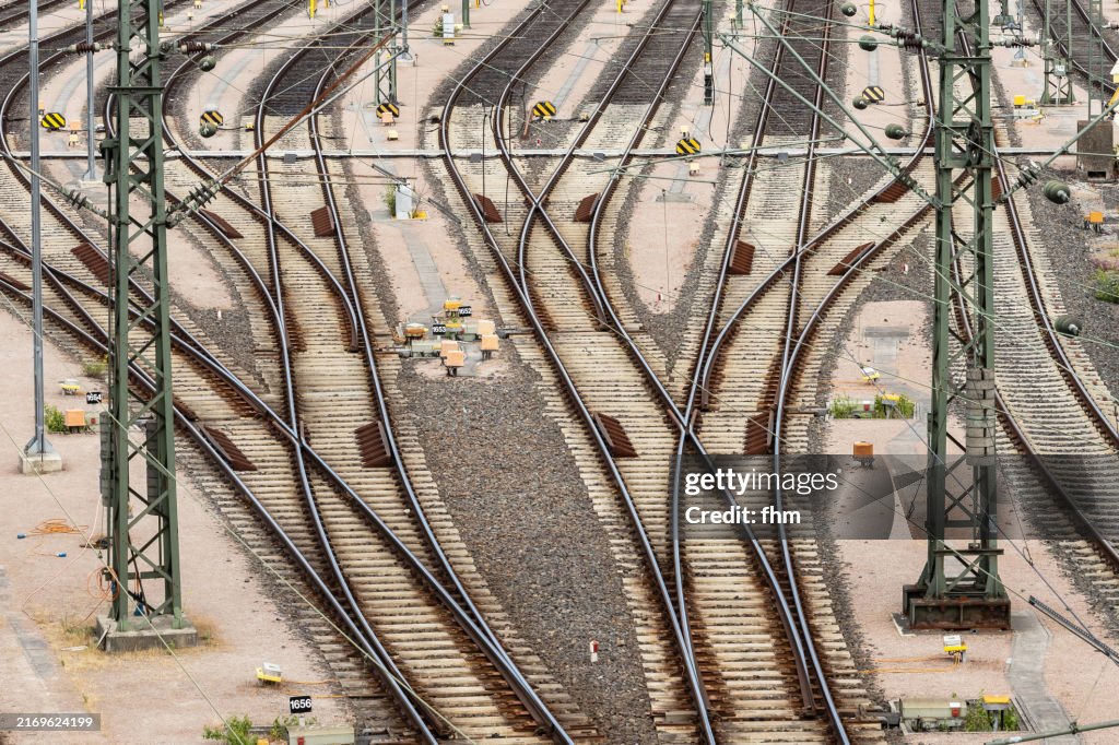 Many switches and empty railway tracks at a marshalling yard
