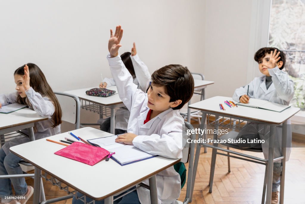 Questions Class Pic Children Asking Questions During Class At School High-Res Stock Photo ...