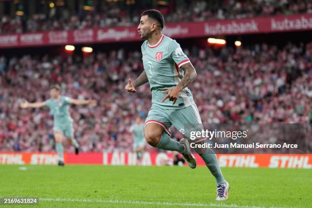 Angel Correa of Atletico de Madrid celebrates scoring his team's first goal during the LaLiga match between Athletic Club and Atletico de Madrid at...
