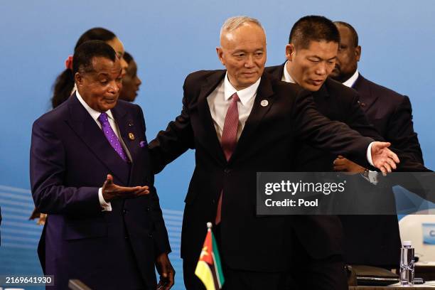 Republic of the Congo President Denis Sassou Nguesso and China's Politburo Standing Committee member Cai Qi arrive for the High-Level Meeting on...