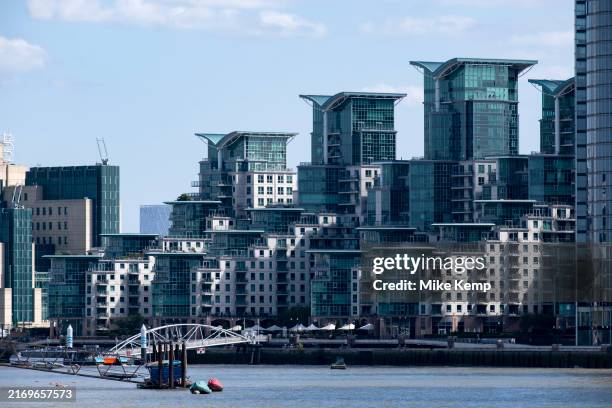 St George Wharf glass apartment complex at Vauxhall on 29th August 2024 in London, United Kingdom. St George Wharf is a riverside development located...