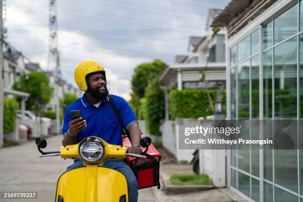 African Delivery Rider 124 African Delivery Motorbike Stock Photos, High-Res Pictures, and ...