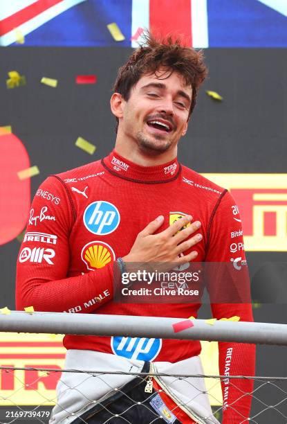Race winner Charles Leclerc of Monaco and Ferrari celebrates on the podium during the F1 Grand Prix of Italy at Autodromo Nazionale Monza on...