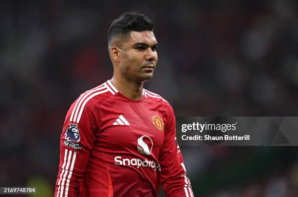 Casemiro of Manchester United looks dejected, as they walk off for half time during the Premier League match between Manchester United FC and...