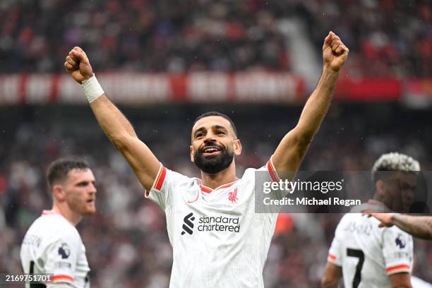 Mohamed Salah of Liverpool celebrates scoring his team's third goal during the Premier League match between Manchester United FC and Liverpool FC at...