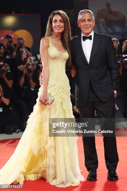 Amal Clooney and George Clooney attend the "Wolfs" red carpet during the 81st Venice International Film Festival on September 01, 2024 in Venice,...