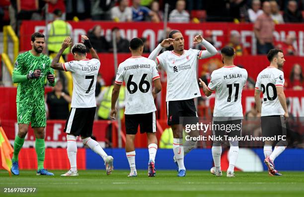 Alisson Becker, Luis Diaz, Trent Alexander-Arnold, Virgil Van Dijk, Mohamed Salah and Diogo Jota of Liverpool before the Premier League match between...
