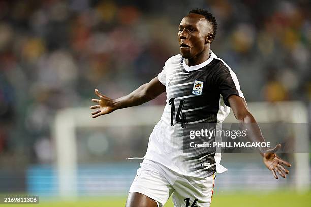 Uganda's forward Denis Omedi celebrates after scoring his team's first goal during the 2025 CAF Africa Cup of Nations Group K qualifying match...