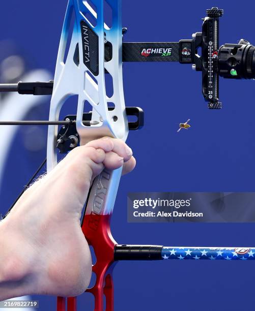 Matt Stutzman of Team United States competes against Nathan MacQueen of Team Great Britain in the Para Archery Men's Individual Compound Open...