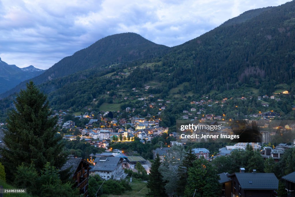 High angle view of Saint-Gervais-les-Bains illuminated at dusk, France.