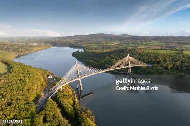 térénez bridge at sunset after a rain shower - aerial view - cable stayed bridge stock pictures, royalty-free photos & images