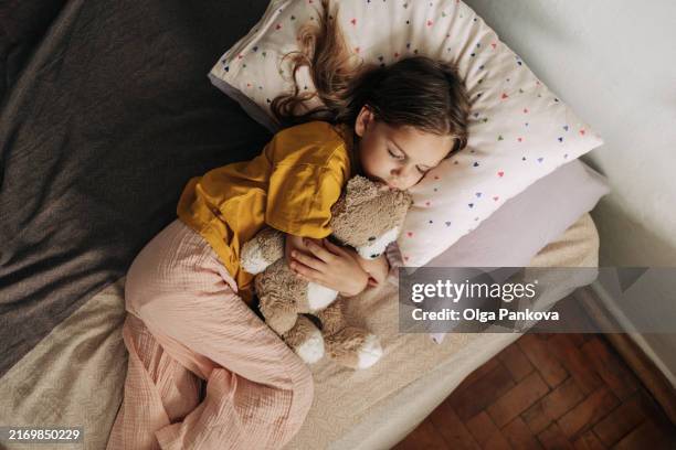 young girl during daytime sleep - bedtime stock pictures, royalty-free photos & images