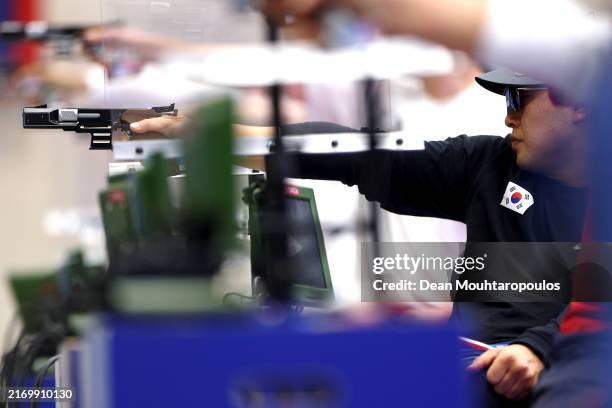 Sea Kyun Park of Team Republic of Korea competes in the Mixed 25m Pistol SH1 on day five of the Paris 2024 Summer Paralympic Games at Chateauroux...