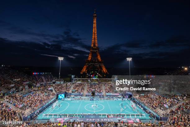 General view of the action at sunset with the Eiffel Tower in the background during the Blind Football Preliminary Round Match Between Brazil and...