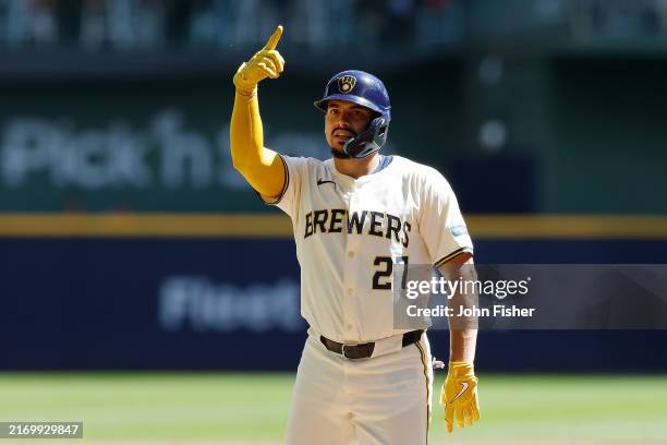 Willy Adames of the Milwaukee Brewers reacts before crossing home plate after hitting a three run homer in the first inning against the St. Louis...