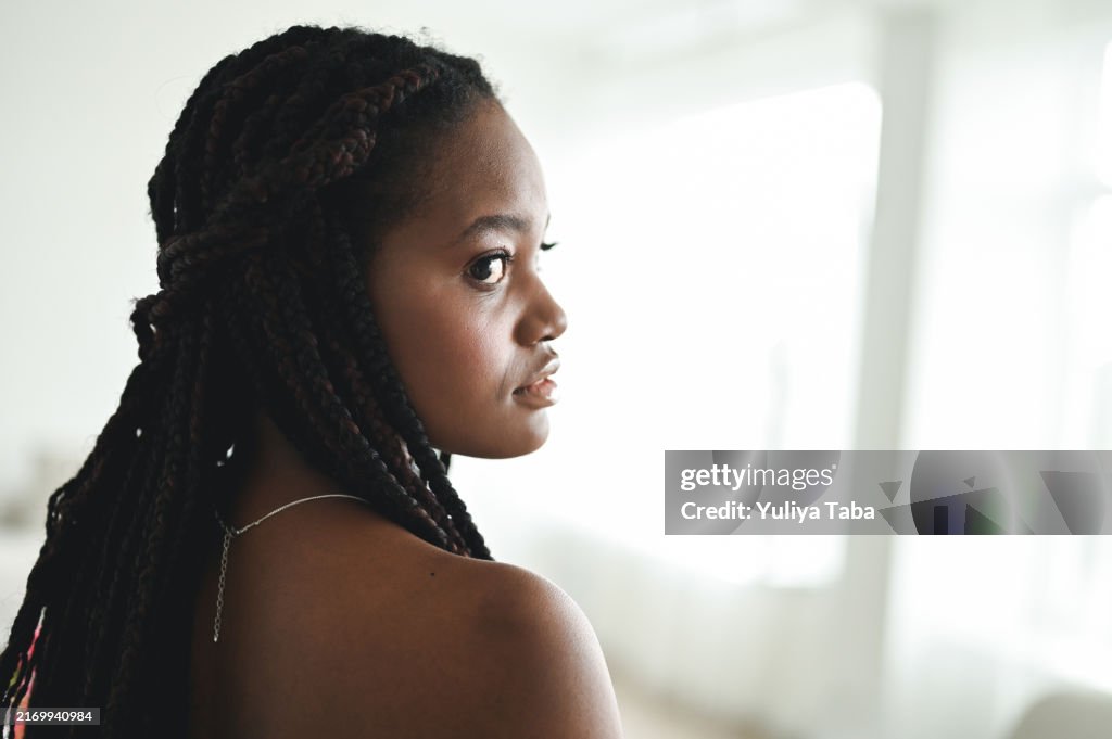 Portrait of a woman with braided hair