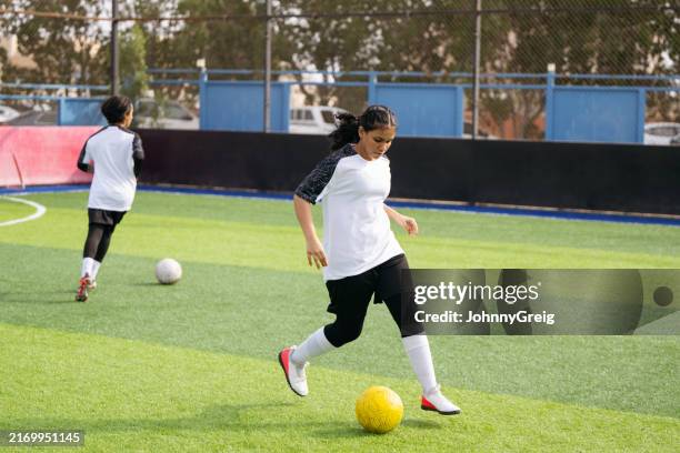 saudi teenage girl footballer training - teenagers only stock pictures, royalty-free photos & images