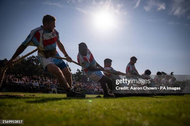 Competitors take part in the tug of war during the Braemar Gathering highland games at the Princess Royal And Duke Of Fife Memorial Park held a short...