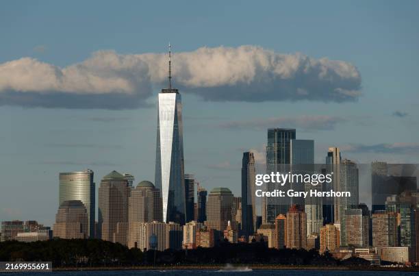 The sun sets on the skyline of lower Manhattan and One World Trade Center in New York City on September 2 as seen from Jersey City, New Jersey.