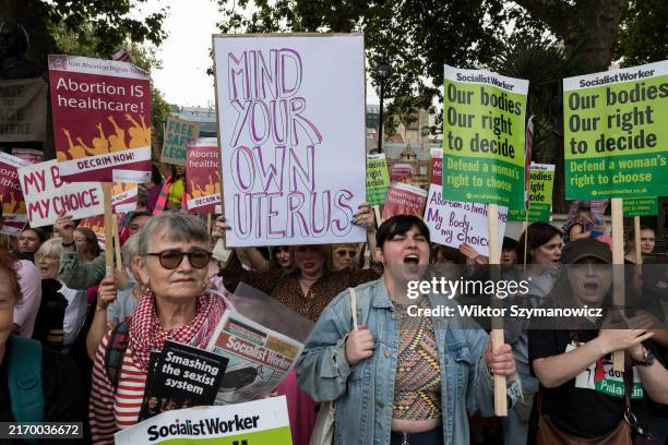 Pro-choice supporters stage a demonstration in Parliament Square to campaign for women's reproductive rights around the world as a counter-protest to...