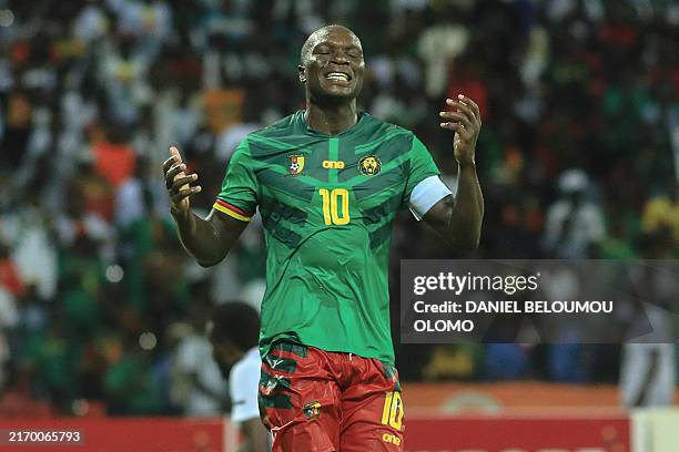 Cameroon's striker Vincent Aboubakar reacts after missing a goal during 2025 CAF Africa Cup of Nations group J football match between Cameroon and...