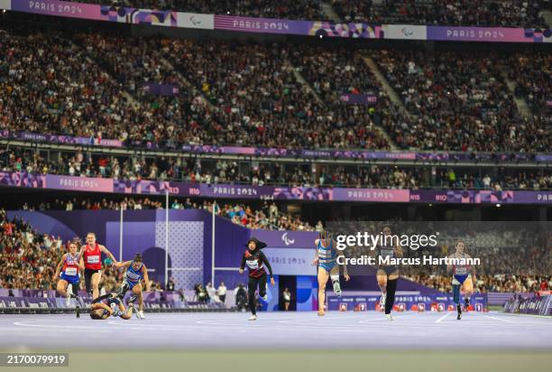 Ambra Sabatini and Monica Graziana Contrafatto of Team Italy falling at the finish line while Martina Caironi of Team Italy wins Gold in the Women's...