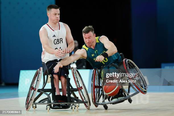 Philip James Pratt of Team Great Britain and Jannik Blair of Team Australia battle for the ball during the Wheelchair Basketball Men's Quarterfinal...