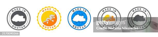 made in bhutan label set, product emblem on white isolated background. - thimphu stock illustrations
